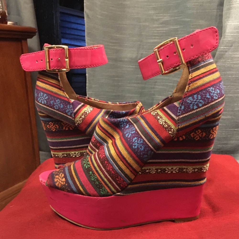 Multi-colored wedge style heels. Size 7